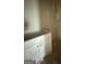 Bathroom vanity cabinet wrapped in protective plastic at 136 Asa Moseley Rd, Mcdonough, GA 30252