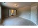 Spacious bedroom with multiple doors leading to bathroom and closets at 136 Asa Moseley Rd, Mcdonough, GA 30252