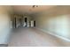 Large, neutral bedroom with recessed lighting, multiple doorways offers flexibility for various uses and configurations at 136 Asa Moseley Rd, Mcdonough, GA 30252