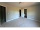 A spacious bedroom with neutral walls and natural light provides a blank canvas for personalization and relaxation at 136 Asa Moseley Rd, Mcdonough, GA 30252