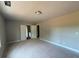 Spacious room with a ceiling light and open double doors at 136 Asa Moseley Rd, Mcdonough, GA 30252