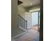 Entryway featuring a staircase with decorative railings and an open door to the exterior at 136 Asa Moseley Rd, Mcdonough, GA 30252