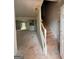 Spacious entryway featuring a staircase and an open view to a bright backyard at 136 Asa Moseley Rd, Mcdonough, GA 30252