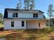 Charming two-story home showcasing modern design, white siding, and a welcoming covered porch at 136 Asa Moseley Rd, Mcdonough, GA 30252