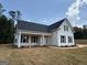 Charming two-story home with a landscaped front yard at 136 Asa Moseley Rd, Mcdonough, GA 30252