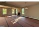 Spacious living room featuring a cozy fireplace, ceiling fan, and light fixture at 136 Asa Moseley Rd, Mcdonough, GA 30252