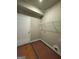 Practical mud room with neutral paint, door to outside, and wire shelving at 136 Asa Moseley Rd, Mcdonough, GA 30252