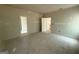 Bright bedroom with open doorway, electrical outlets and painted trim, ready to customize at 148 Asa Moseley Rd, Mcdonough, GA 30252