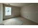 Bedroom with a window and electrical outlets with trim ready to customize at 148 Asa Moseley Rd, Mcdonough, GA 30252