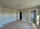 Spacious bedroom showcasing neutral paint and trim, awaiting personalization to create a relaxing retreat at 148 Asa Moseley Rd, Mcdonough, GA 30252