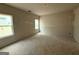 Spacious bedroom featuring ample natural light from two windows ready to customize at 148 Asa Moseley Rd, Mcdonough, GA 30252