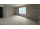 Neutral bedroom featuring a window and electrical outlets, ready to customize at 148 Asa Moseley Rd, Mcdonough, GA 30252