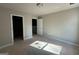 Bright bedroom with open doorway to walk in closet at 148 Asa Moseley Rd, Mcdonough, GA 30252