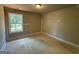 Bedroom with natural light, white base trim, and bright window views at 148 Asa Moseley Rd, Mcdonough, GA 30252