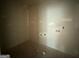 Empty room features freshly painted walls, new trim and electrical hookups at 148 Asa Moseley Rd, Mcdonough, GA 30252