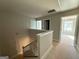 Second floor hallway with wood railing at 148 Asa Moseley Rd, Mcdonough, GA 30252