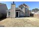 Two-story house with backyard, patio, and fenced yard at 270 Marriott Dr, South Fulton, GA 30349