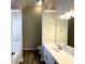 Bright bathroom with a double vanity, bathtub, and shower at 270 Marriott Dr, South Fulton, GA 30349