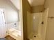 Clean bathroom with a bathtub and separate shower at 270 Marriott Dr, South Fulton, GA 30349