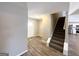 Front entry with stairs leading upstairs and view into the kitchen at 270 Marriott Dr, South Fulton, GA 30349