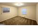 Bright bedroom with neutral walls and carpeted floors at 211 Hemphill School Rd, Atlanta, GA 30331