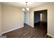 Elegant dining area with hardwood floors and a chandelier at 211 Hemphill School Rd, Atlanta, GA 30331