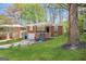 Brick ranch home with a spacious yard and attached garage at 211 Hemphill School Rd, Atlanta, GA 30331