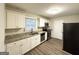 Modern kitchen with granite countertops and stainless steel appliances at 211 Hemphill School Rd, Atlanta, GA 30331