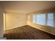 Spacious living room with hardwood floors and large windows at 211 Hemphill School Rd, Atlanta, GA 30331