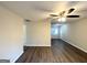 Spacious living room with hardwood floors and ceiling fan at 3961 Cornell Sw Blvd, Atlanta, GA 30331