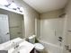 Clean bathroom with a tub, toilet and vanity at 1134 Wagon Trce, Douglasville, GA 30134