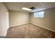 Carpeted bedroom with neutral walls and window at 1134 Wagon Trce, Douglasville, GA 30134
