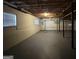Spacious garage with an overhead door and pegboard at 1134 Wagon Trce, Douglasville, GA 30134