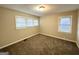 Bright bedroom with neutral walls and new carpet at 1991 Marvin Sw Ln, Atlanta, GA 30311