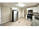 Modern kitchen with stainless steel appliances and granite countertops at 6419 Katherine St, Douglasville, GA 30134