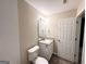 Clean bathroom with vanity, toilet and shower at 1024 Ada Nw Ave, Atlanta, GA 30318