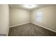 Small bedroom with carpet and window coverings at 1024 Ada Nw Ave, Atlanta, GA 30318