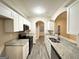 Modern kitchen with granite countertops and stainless steel appliances at 1024 Ada Nw Ave, Atlanta, GA 30318