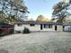 Ranch house with large backyard, patio, and mature trees at 2048 Glendale Dr, Decatur, GA 30032