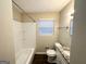 Clean bathroom with granite vanity and a shower/tub combo at 2048 Glendale Dr, Decatur, GA 30032