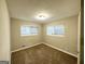 Spacious bedroom with neutral walls and plush carpeting at 2048 Glendale Dr, Decatur, GA 30032