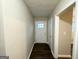 Bright entryway with dark laminate flooring and interior door at 2048 Glendale Dr, Decatur, GA 30032
