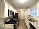Modern kitchen with granite countertops and stainless steel appliances at 2048 Glendale Dr, Decatur, GA 30032