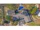 Aerial view of a home showcasing a private swimming pool and mature landscaping at 505 River Valley Rd, Sandy Springs, GA 30328
