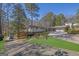 Attractive single-Gathering home with lush landscaping and a spacious driveway at 505 River Valley Rd, Sandy Springs, GA 30328