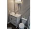 Bathroom with quartz vanity and updated fixtures at 471 Glen Terrace Rd, Auburn, GA 30011