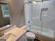 Updated bathroom with white subway tile and quartz vanity at 471 Glen Terrace Rd, Auburn, GA 30011