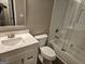 Updated bathroom with white subway tile and quartz vanity at 471 Glen Terrace Rd, Auburn, GA 30011