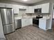 Modern kitchen featuring stainless steel appliances and quartz countertops at 471 Glen Terrace Rd, Auburn, GA 30011