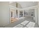 Bright, open living room with high ceilings and lots of natural light at 3905 Colonial Sw Trl, Lilburn, GA 30047